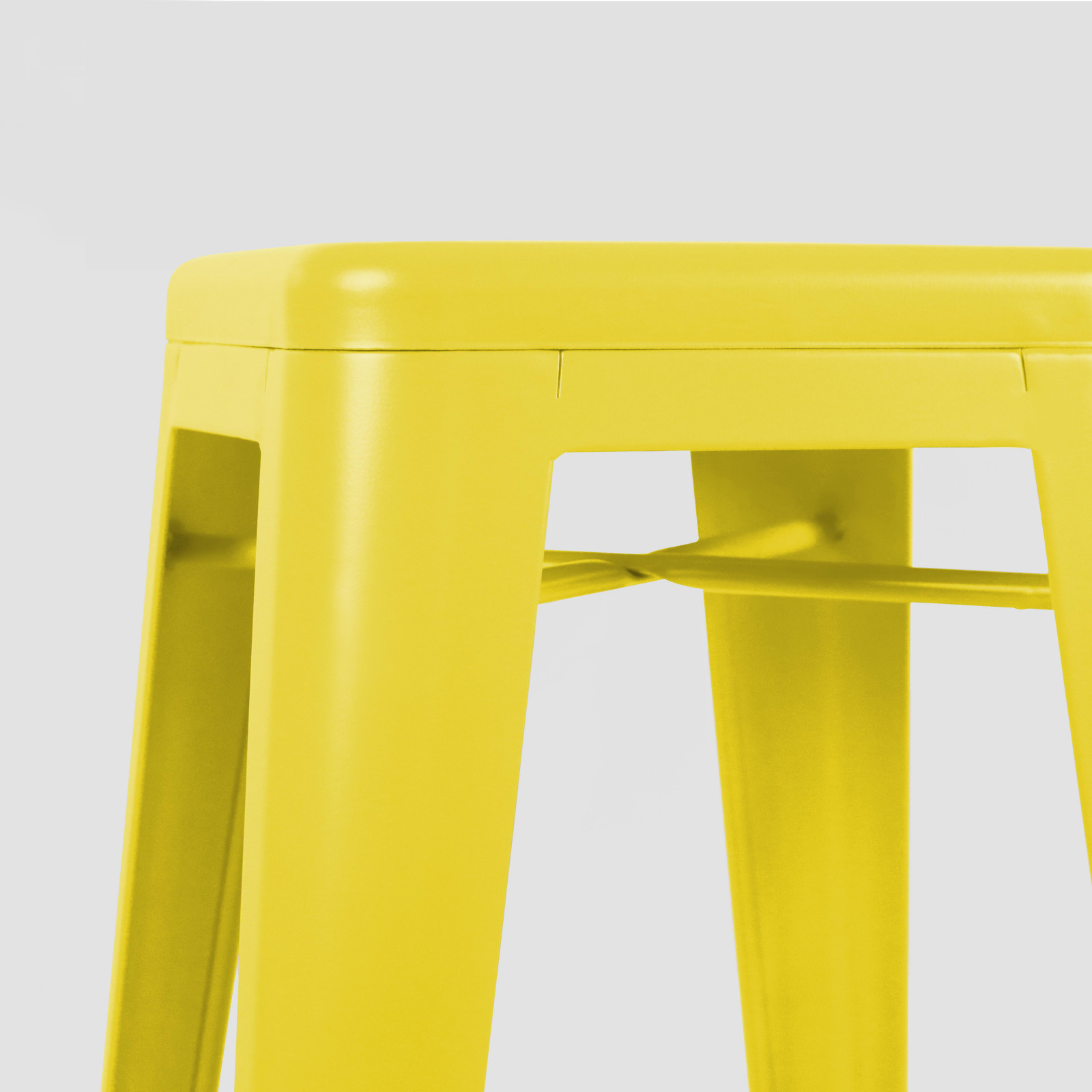 Tabouret en métal jaune