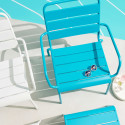 Fauteuil bas et repose-pieds en métal