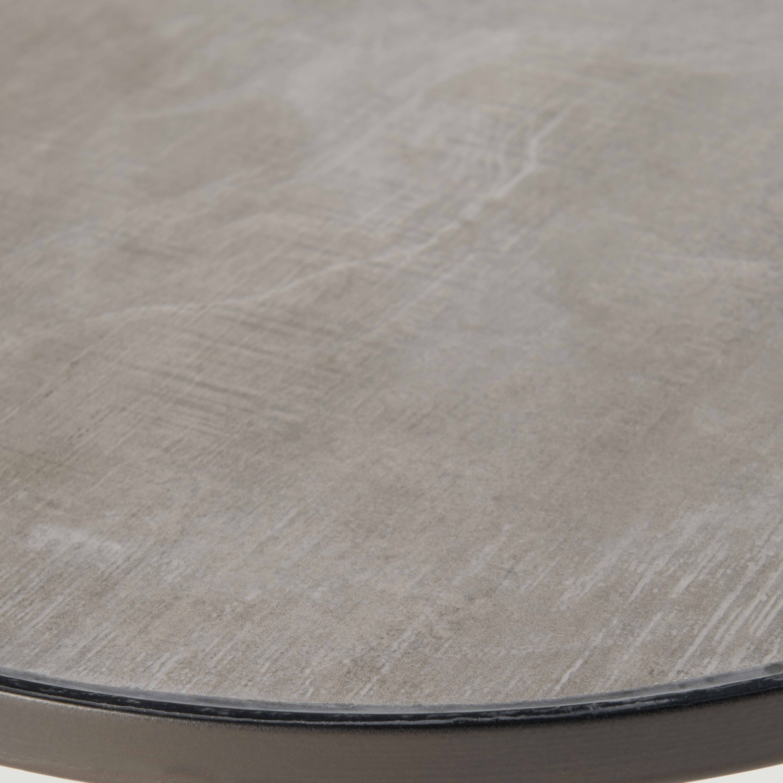 Table basse ronde avec plateau effet béton