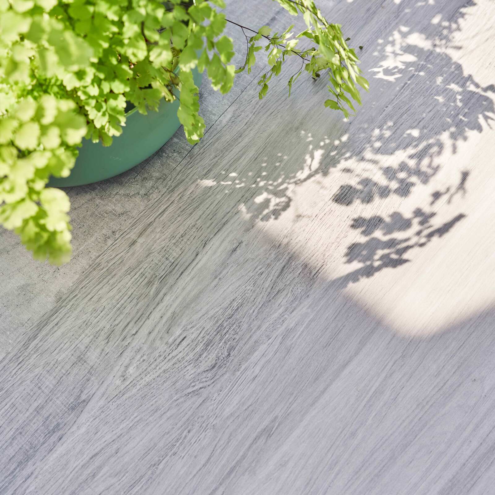 Table de jardin en céramique effet bois grisé (230 x 95 x 74 cm)