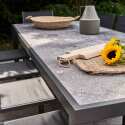 Table de jardin en céramique effet stamp 230 x 95 cm avec 8 chaises et 2 chaises avec accoudoirs