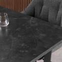 Table à manger extensible en acier et MDF effet marbre noir - 6 à 8 personnes