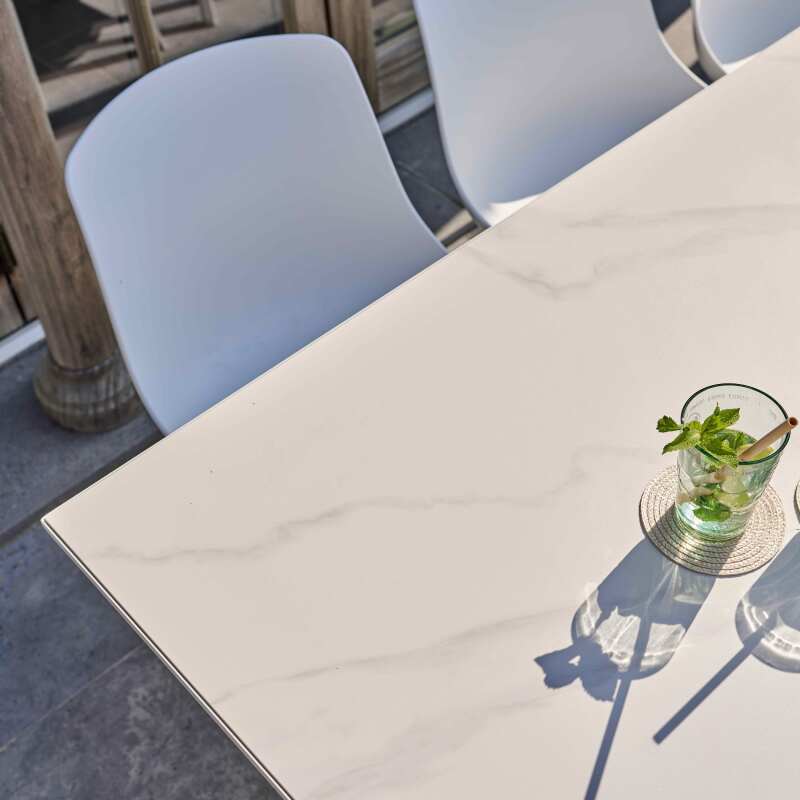 Table de jardin rectangulaire en aluminium et pierre frittée 180 x 90 cm et 8 chaises