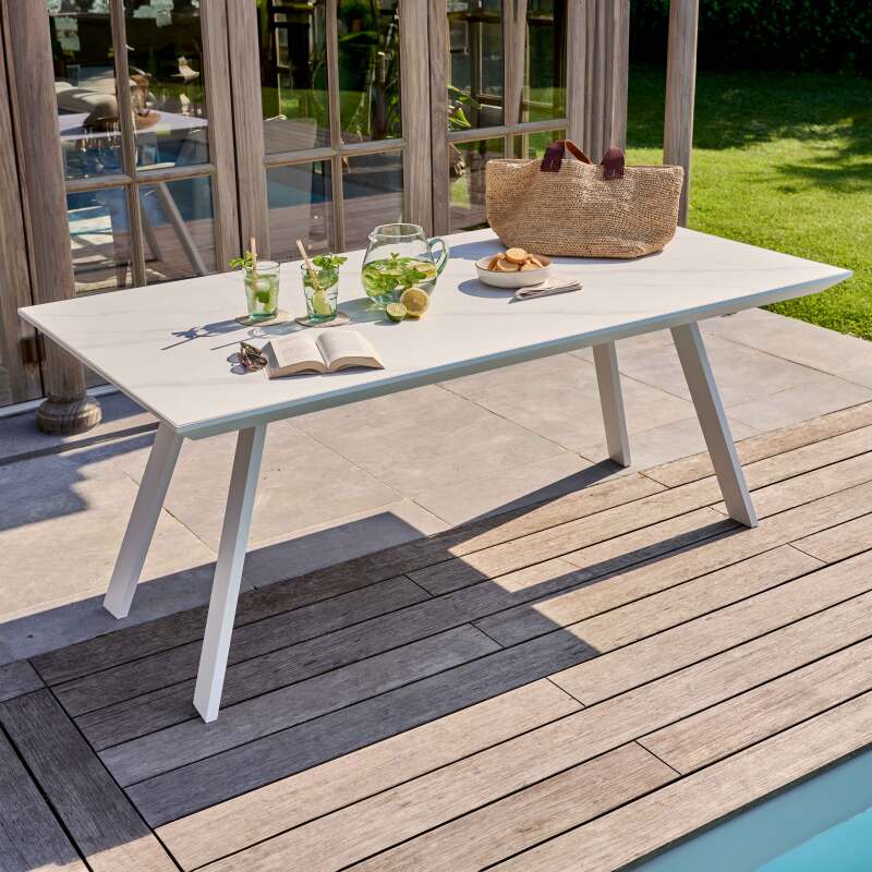Table de jardin rectangulaire en aluminium et pierre frittée 180 x 90 cm et 8 chaises