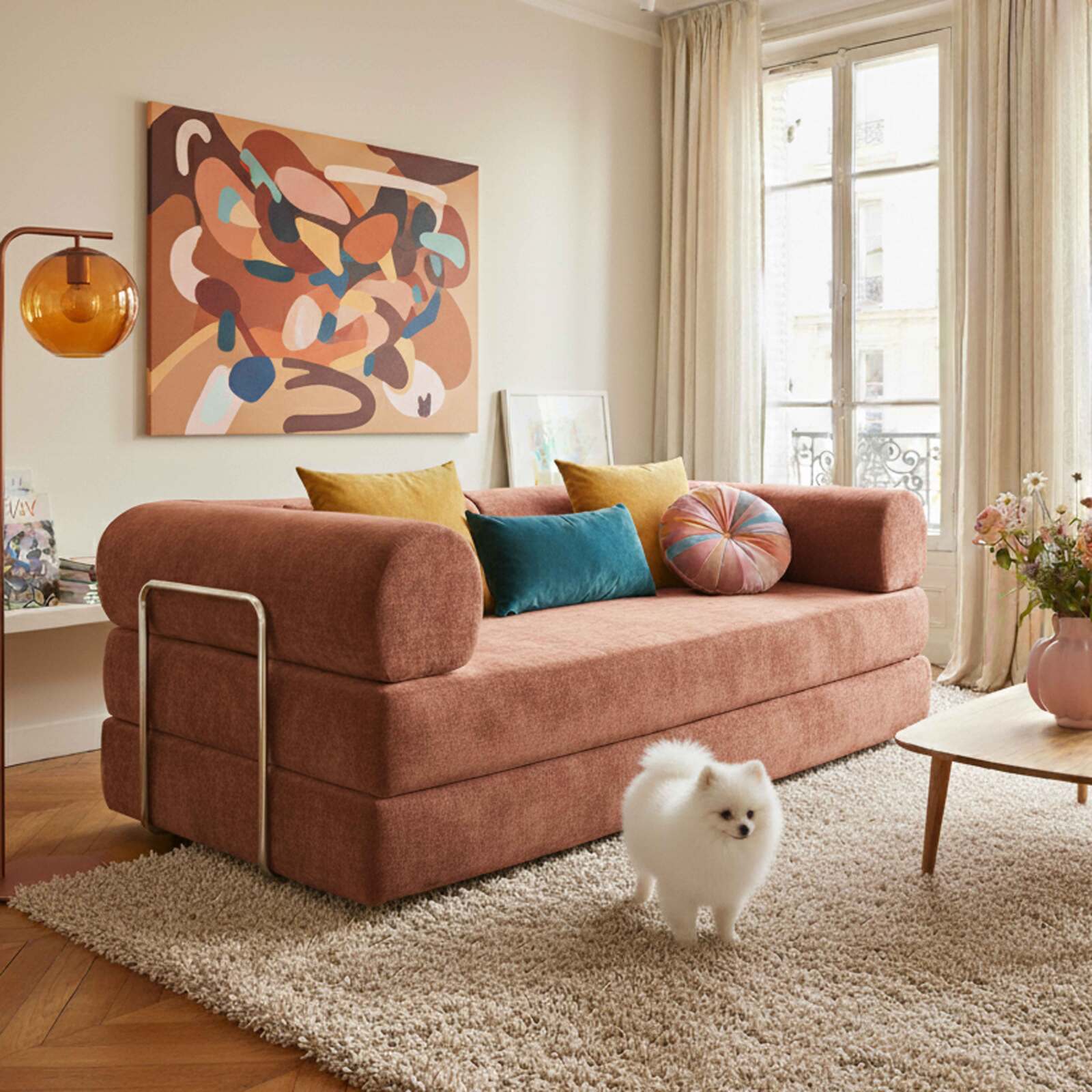 Canapé convertible 2 places en tissu avec coussins