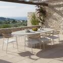 Table de jardin ovale effet béton lisse 250x110 cm et 8 chaises empilables en textilène - Ambiance