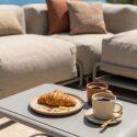 Salon de jardin modulable 4 places avec structure, 1 chauffeuse, 2 fauteuils d'angle, 1 pouf et 1 table basse