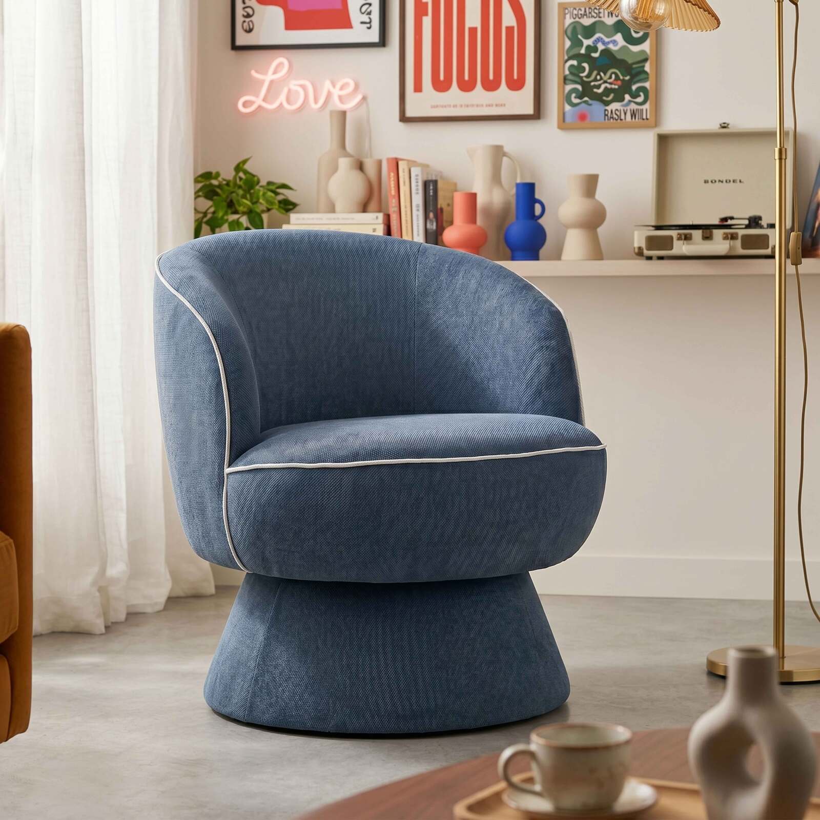 Fauteuil pivotant en tissu