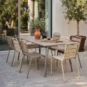 Table de jardin en métal 180x90 cm et 8 chaises dépareillées