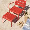 Fauteuil de jardin bas en métal et repose-pieds