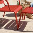 Fauteuil de jardin bas en métal et repose-pieds