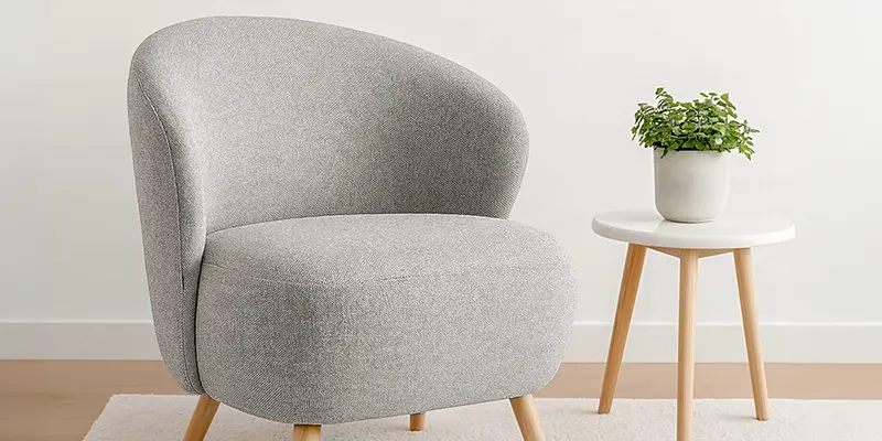 Fauteuil d'intérieur en tissu et pieds en bois